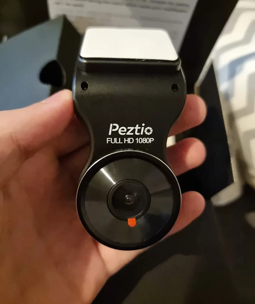 Unboxed Peztio Full HD 1080P dash cam in my hand